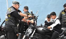 Motosiklet tutkunları  Van'da çocukların yüzünü güldürdü