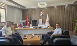 Başkan Dinç Adıgüzel'i ziyaret etti