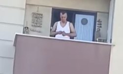 Balkonda silah şarjörüne mermi dolduran şüpheli yakalandı