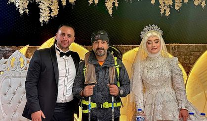 Dağcı kıyafetiyle düğüne katıldı