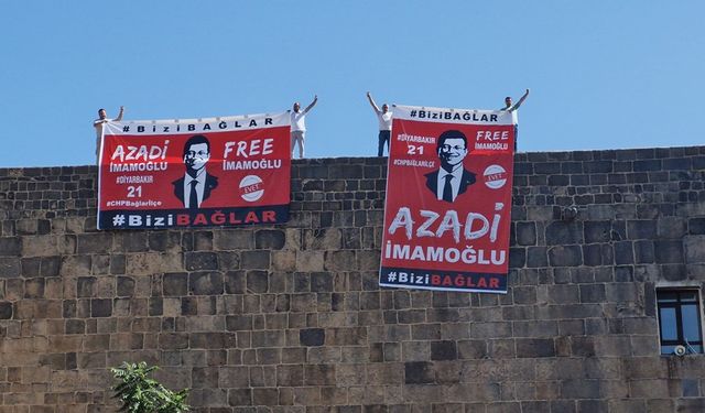 Diyarbakır'da surlara asılan 'İmamoğlu' pankartlarına polis el koydu