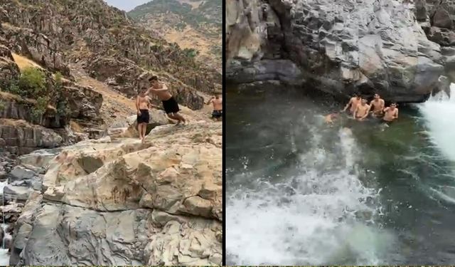 Hakkari'de sıcakta bunalan gençler derede serinledi