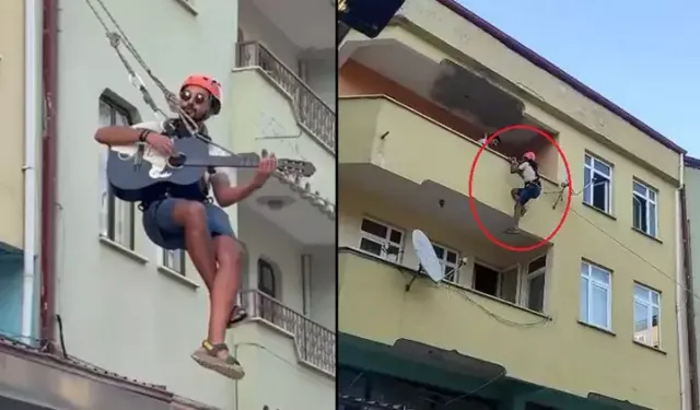 Eşyalarını taşıdığı halatın üzerinde gitar çaldı