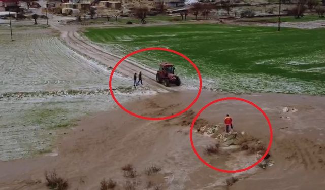 Mahsur kalan kişi traktörle kurtarıldı