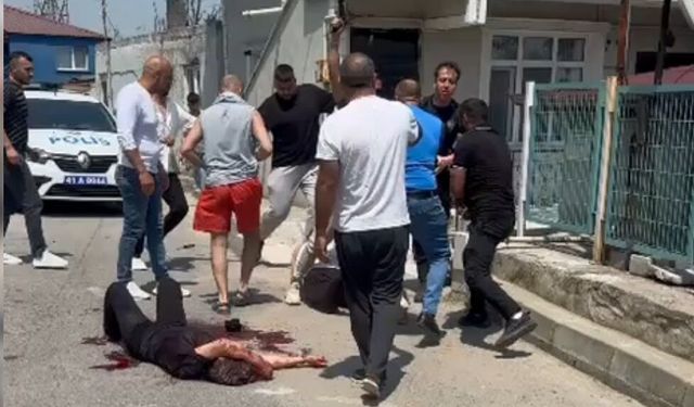 Eşini sokak ortasında bıçaklayan şüpheliye linç girişimi